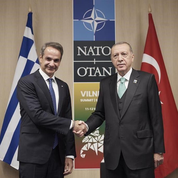 Turkish and Greek leaders turn on the charm in Athens as they vow to leave years of animosity behind